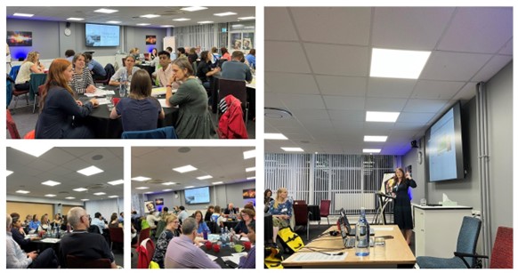 photo of a room full of people participating in an event